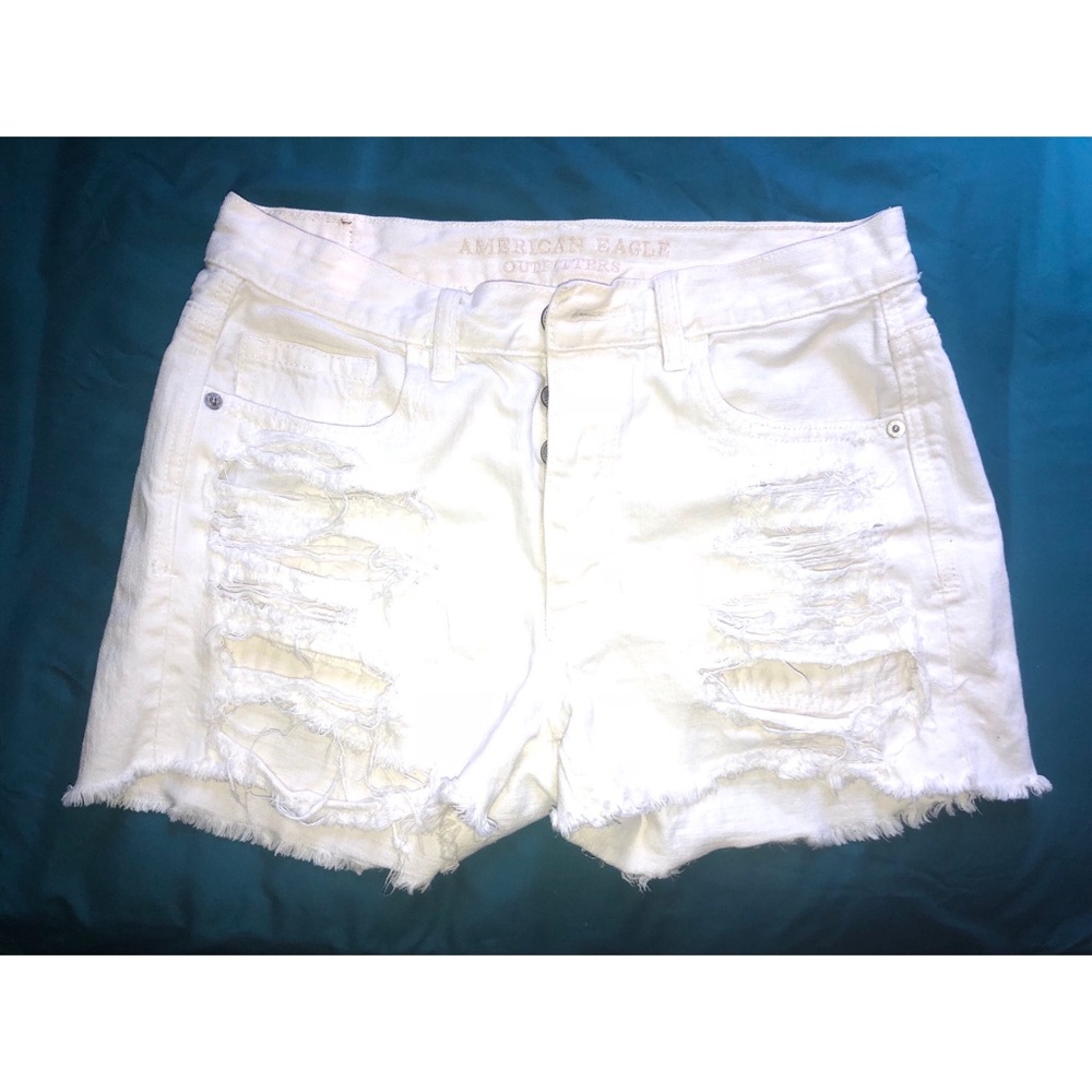 White high waisted denim shorts.